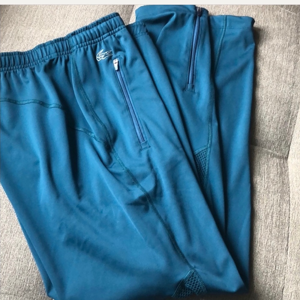 Lacoste sweats, Ankle Zipper, Front Pockets Zipper, Drawstring elastic waist .